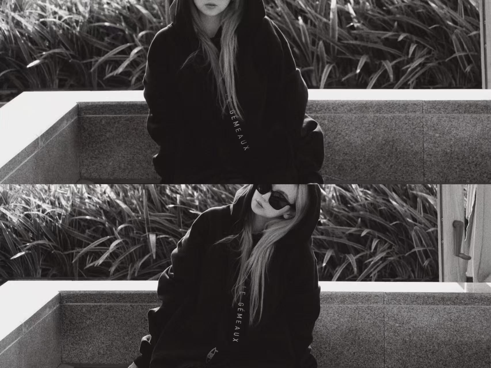 Black-and-white diptych of a person seated in a black LE GÉMEAUX hoodie, shown in two poses.
